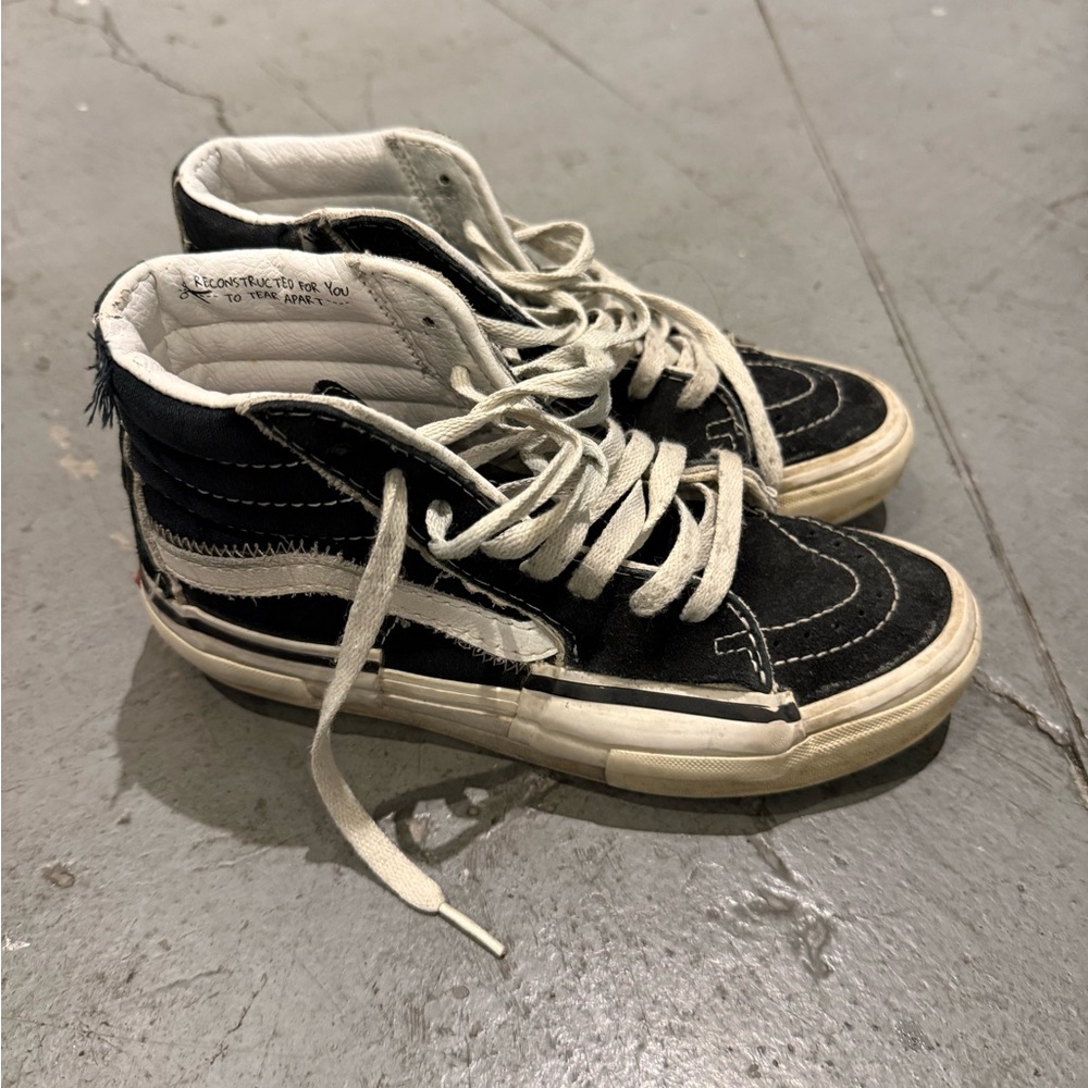 Vans Black and White High-Top Sneakers